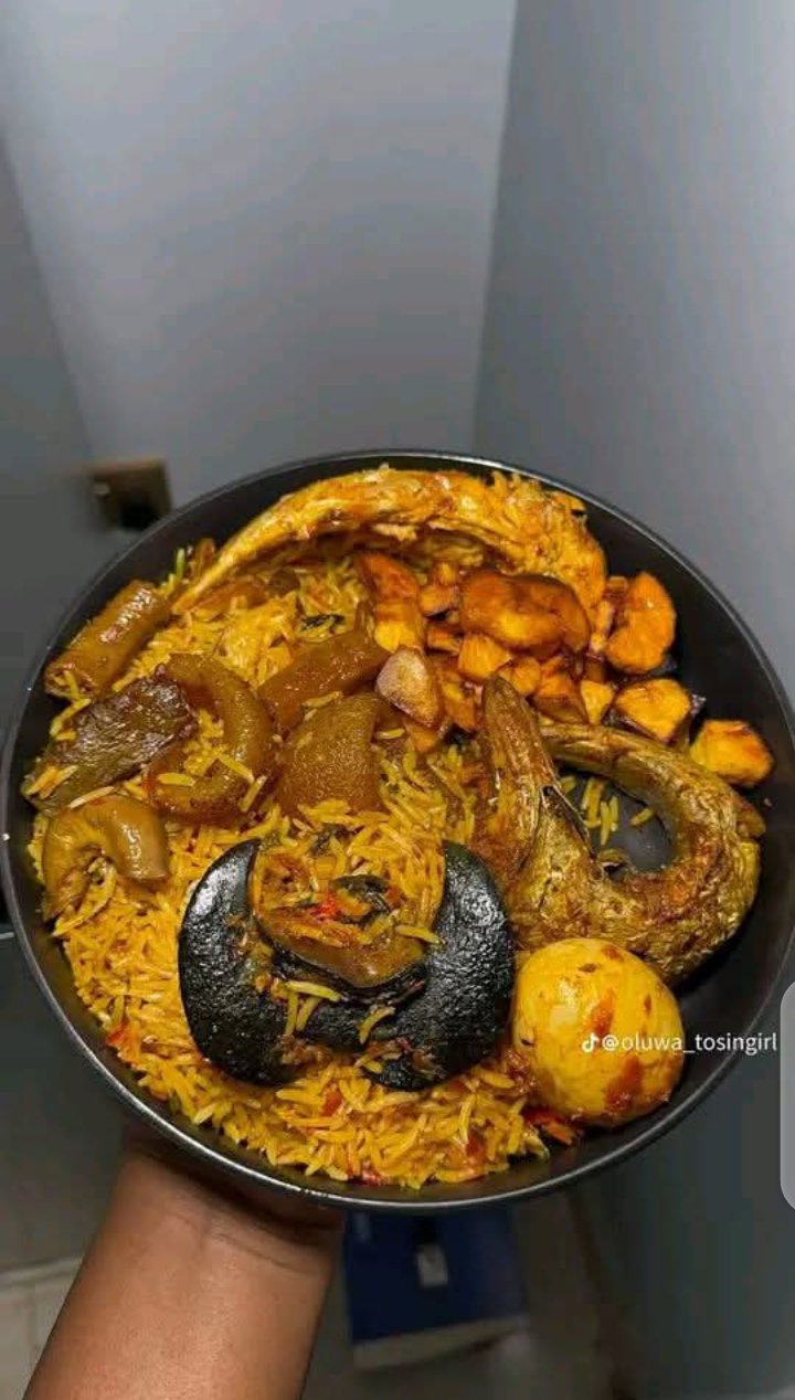 Jollof rice with fresh snails from Rutech Agribusiness